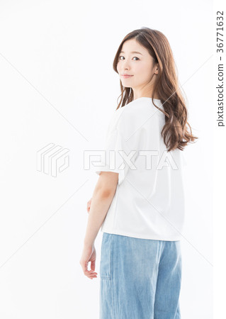 Young woman look back 36771632
