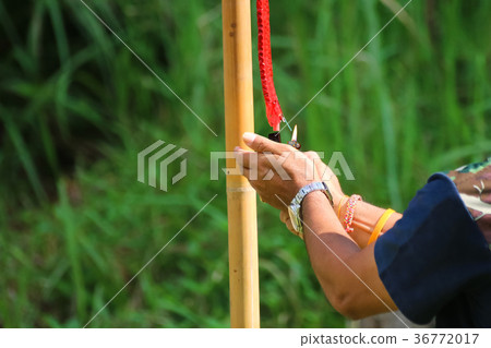People with firecrackers pay respect to shrine People with firecrackers pay respect to shrine 36772017