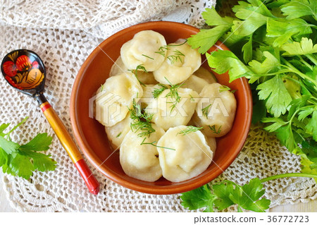 Traditional russian pelmeni with minced meat  36772723