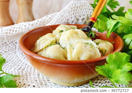 Traditional russian pelmeni with minced meat Traditional russian pelmeni with minced meat 36772727