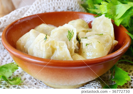 Traditional russian pelmeni with minced meat Traditional russian pelmeni with minced meat 36772730