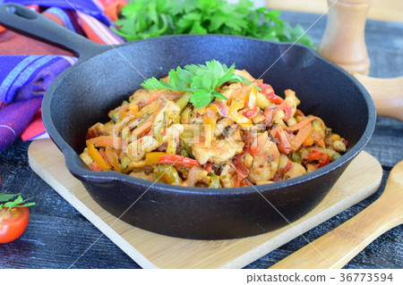 Stew from chicken fillet with zucchini paprika 36773594