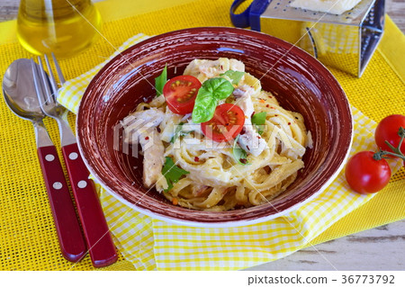 Pasta with chicken fillet, cream, onion. 36773792