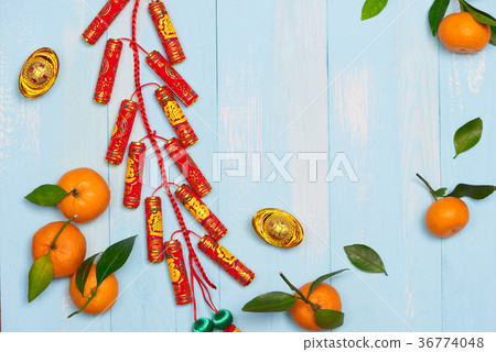 Lunar new year.Firecrackers and Chinese gold ingot Lunar new year.Firecrackers and Chinese gold ingot 36774048