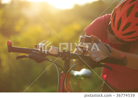 cyclist mount the action camera on mountain bike 36774539