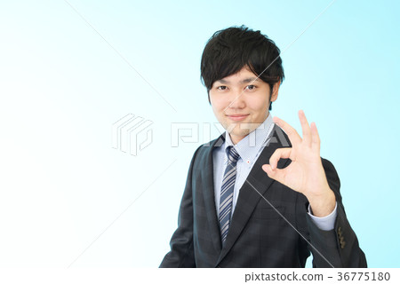 A businessman who is pleased 36775180