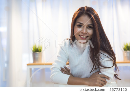 Cute girl smiling and relaxing 36778120