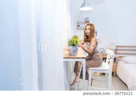 The cute girl drink coffee The cute girl drink coffee 36778121