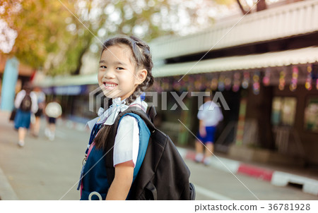 Happy asian girl arriving school from home Happy asian girl arriving school from home 36781928