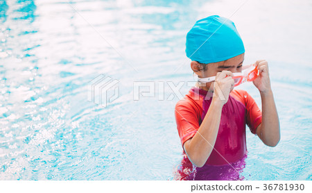 Funny little girl swims in a pool Funny little girl swims in a pool 36781930