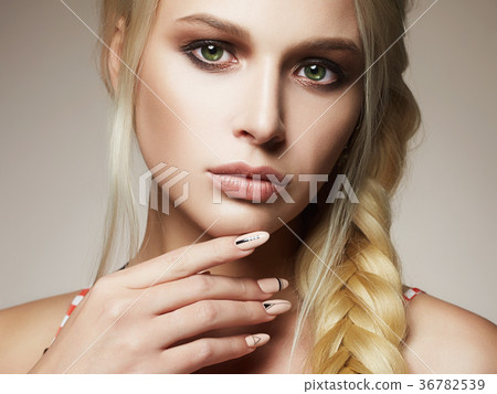 beautiful blonde woman with braid 36782539