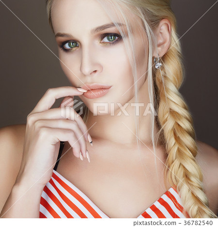 beautiful woman with braid, make up and manicure beautiful woman with braid, make up and manicure 36782540