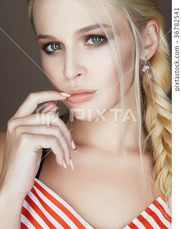 beautiful woman with braid, make up and manicure beautiful woman with braid, make up and manicure 36782541