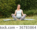 Woman in a lotus pose 36783864
