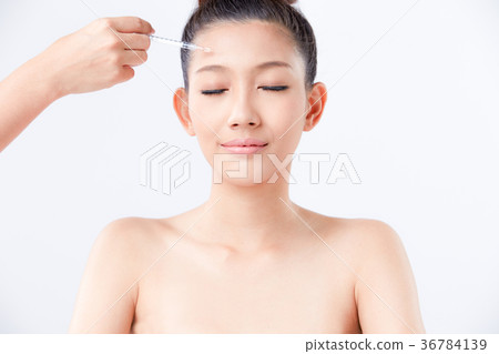 Beautiful woman on isolated White background 36784139