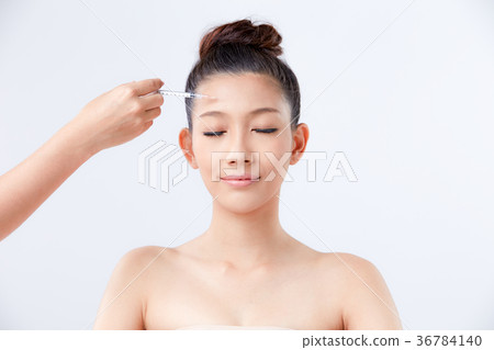 Beautiful woman on isolated White background 36784140