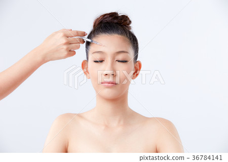 Beautiful woman on isolated White background 36784141