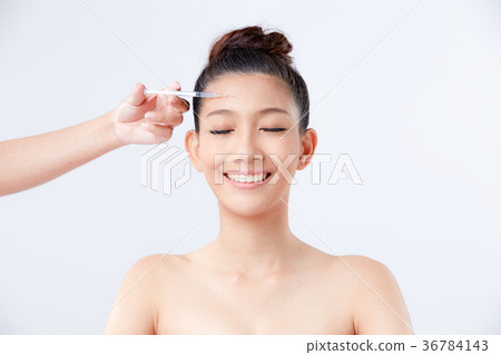 Beautiful woman on isolated White background 36784143