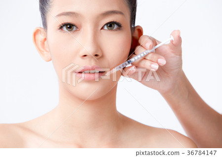 Beautiful woman on isolated White background 36784147