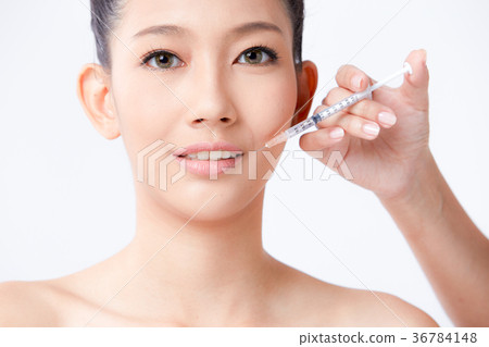 Beautiful woman on isolated White background 36784148