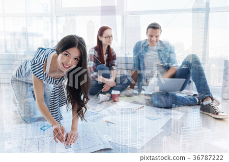Skilled engineer working on new sketch Skilled engineer working on new sketch 36787222