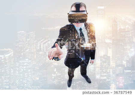 Young businessman wearing VR headset 36787549