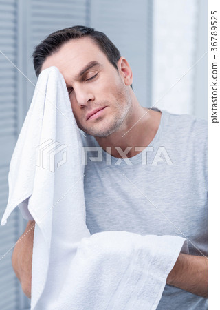 Young handsome man resting after training Young handsome man resting after training 36789525