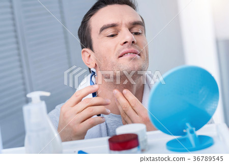 Cute pretty man shaving his bristles 36789545