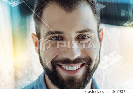 Pleasant joyful man looking straight and having Pleasant joyful man looking straight and having 36790203
