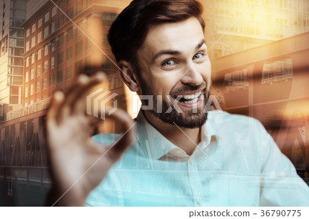 Happy young man showing OK gesture Happy young man showing OK gesture 36790775