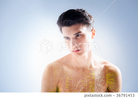 Nice young man looking in front of him Nice young man looking in front of him 36791453