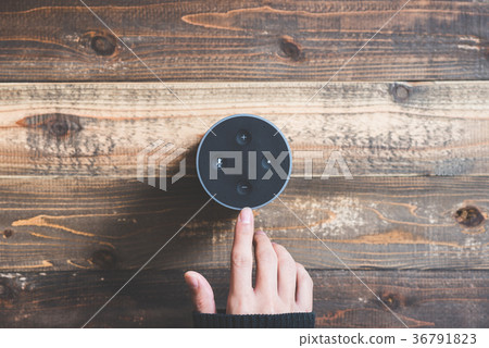 Smart speaker placed on the table Smart speaker placed on the table 36791823