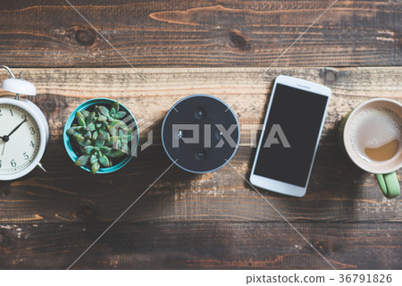 Smart speaker placed on the table 36791826