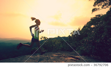 fitness woman trail runner running at mountain top fitness woman trail runner running at mountain top 36792706