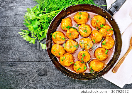 Meatballs in pan on black board top 36792922
