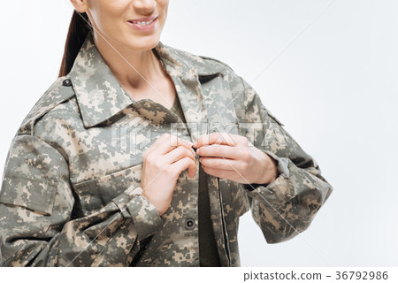 Tender female hands touching button  36792986