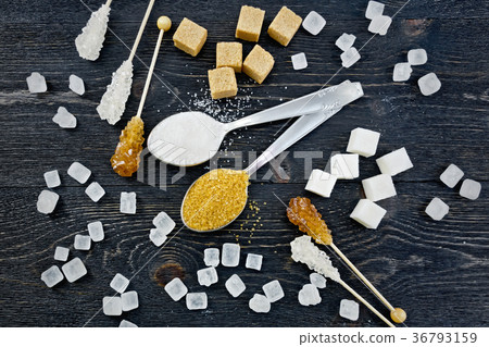 Sugar white and brown different on black board top Sugar white and brown different on black board top 36793159