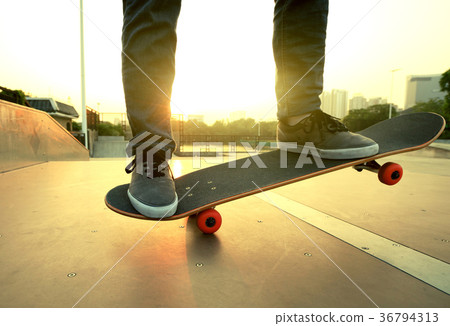 skateboarder legs skateboarding on skatepark ramp 36794313