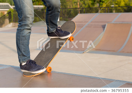 skateboarder legs skateboarding on skatepark ramp 36795355