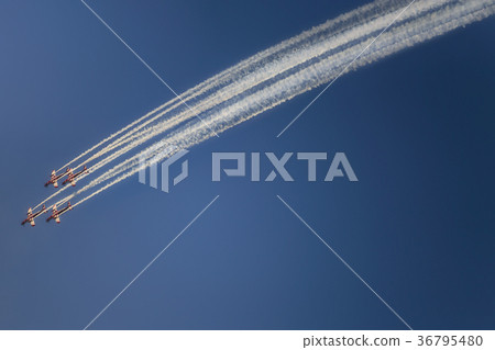 Reactive jet plane flying in formation on blue sky Reactive jet plane flying in formation on blue sky 36795480
