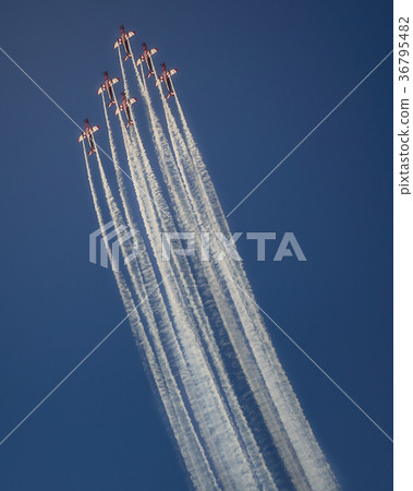 Reactive jet plane flying in formation on blue sky Reactive jet plane flying in formation on blue sky 36795482