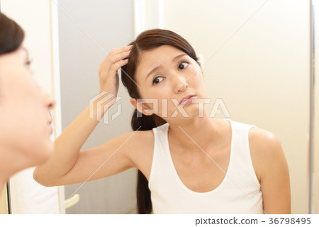 Women dissatisfied with hair care 36798495