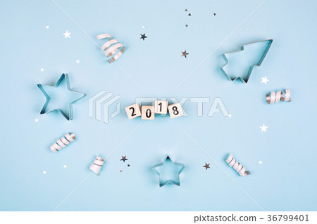 Feliz Navidad text on pastel blue background 36799401