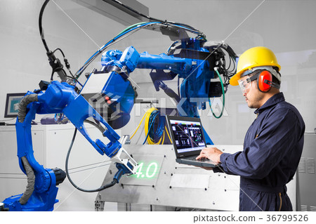 Engineer use computer control laser robotic cuting Engineer use computer control laser robotic cuting 36799526