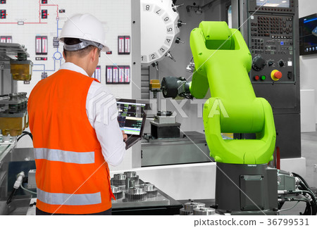 Engineer testing automatic robotic industry Engineer testing automatic robotic industry 36799531