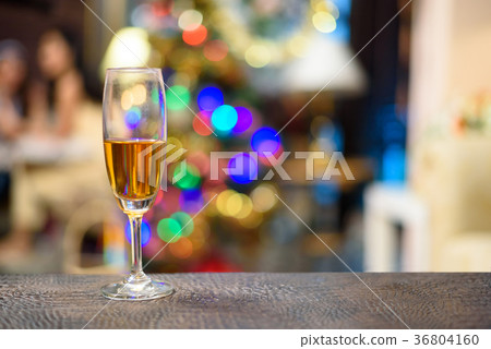 champagne glasse on the table with blur background 36804160