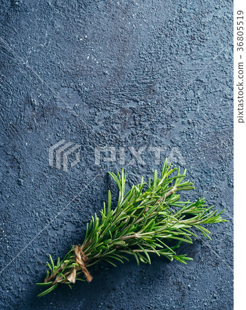 Organic bunch of fresh rosemary on the table Organic bunch of fresh rosemary on the table 36805519
