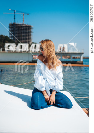 beautiful woman on a beach bed beautiful woman on a beach bed 36805797