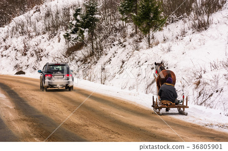 traffic in mountainous rural area in winter traffic in mountainous rural area in winter 36805901
