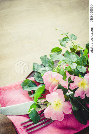 Festive Table setting with pink flowers. 36806090